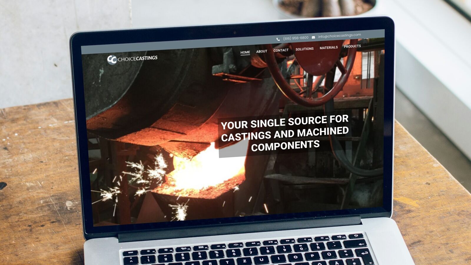 choicecastings.com, a site we built, on a laptop on a workbench
